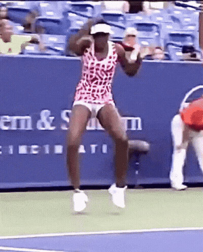 Tennis Player Jumping On Court GIF
