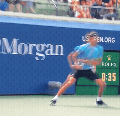 Tennis Player Playing In Front Of Morgan Sign GIF