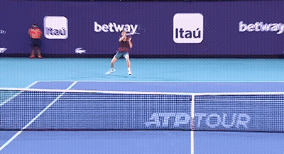 Tennis Player Serving Court With Itau Betway Ads GIF