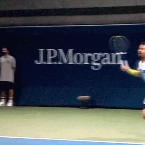 Tennis Player Swinging Racket GIF