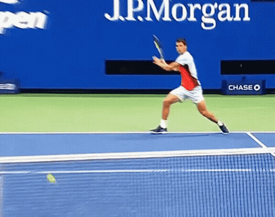 Tennis Player Swinging Racket On Chase Court GIF