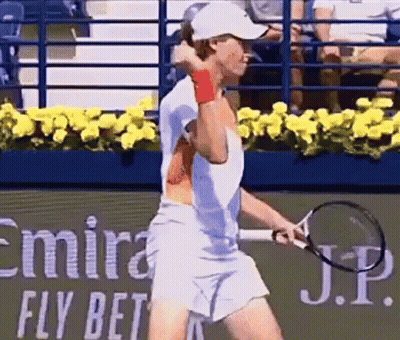 Tennis Player Swinging Racquet In Front Of Kia Ad GIF