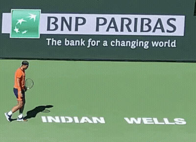 Tennis Player Walking Past BNP Pariba Sign GIF