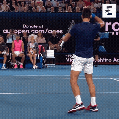 Tennis Player With Donate At Auopen.com/aes Sign GIF