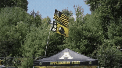 Tent Saying Appalachian State In Front Of Trees GIF