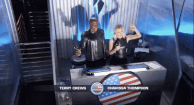 Terry Crews And Carissa Thompson Behind Table GIF