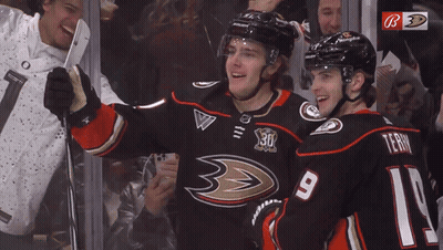 Terry Hugging Another Hockey Player GIF