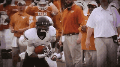 Texas Football Player Running With Ball GIF