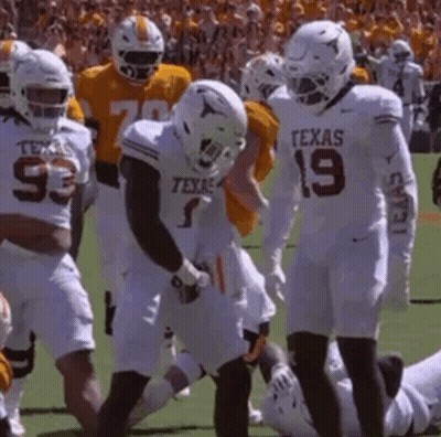 Texas Football Players On Field GIF
