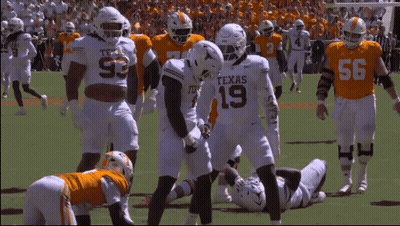 Texas Football Players On Field GIF