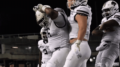 Texas State Football Players Celebrating Touchdown GIF