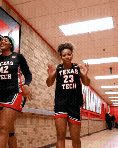 Texas Tech Female Basketball Players Walking Hallway GIF