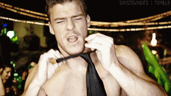 Thad Castle Alan Ritchson Shirtless With Necktie GIF