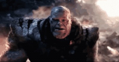 Thanos Close Up In Front Of Cloudy Sky GIF