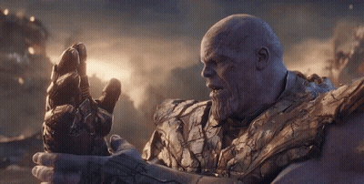 Thanos From Avengers Endgame Holds His Infinity Gauntlet In His Hand GIF