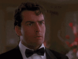 Thats Hot Steaming Collar Charlie Sheen GIF