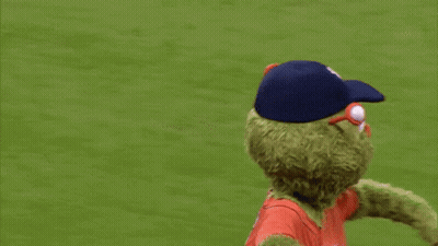 The Astros Mascot Is Wearing A Blue Hat GIF