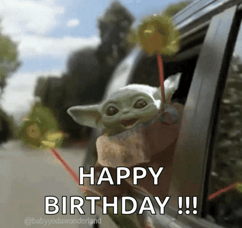 The Baby Yoda Is Holding A Lollipop Out Of A Car Window And Says Happy Birthday GIF