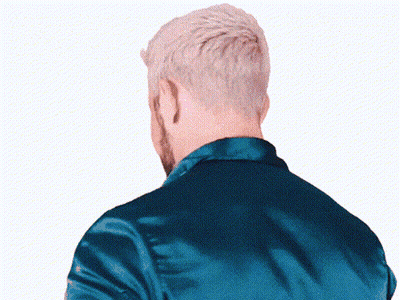 The Back Of A Man 'S Head With A Blue Jacket GIF