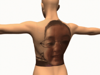 The Back Of A Mannequin With A Picture Of A Girl On It GIF