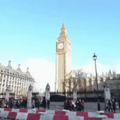 The Big Ben Clock Tower In London Is Surrounded By People GIF