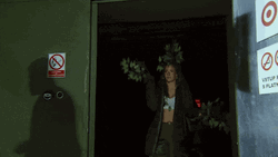 The Challenge Woman With Props Leaves GIF