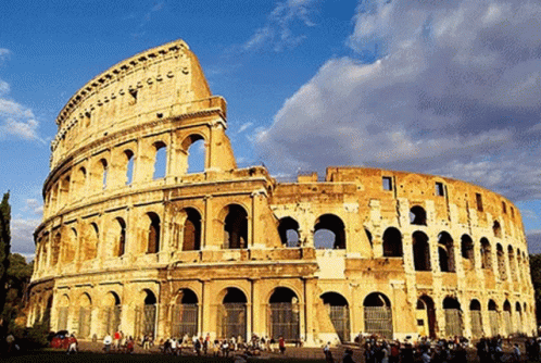 The Colosseum In Rome Is A Large Building With Arches GIF