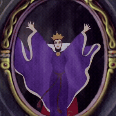 The Evil Queen From Snow White And The Seven Dwarfs Is Shown In A Mirror GIF