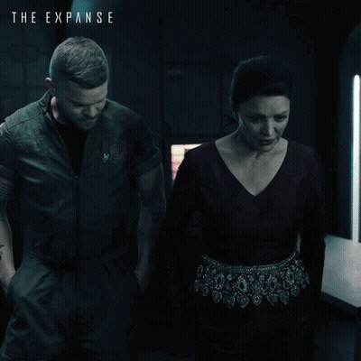 The Expanse Poster With Man And Woman GIF