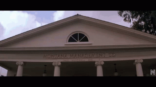 The Front Of A Building That Says Montana Management Co. On It GIF