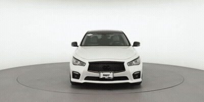 The Front Of A White Car With A License Plate That Says Shift GIF