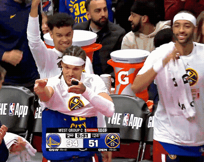 The Golden State Warriors Are Playing The Denver Nuggets In A Game GIF