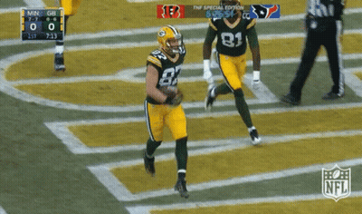The Green Bay Packers Are Playing The Texans On The Field GIF