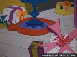 The Grinch Cartoon Slithering Gifts GIF