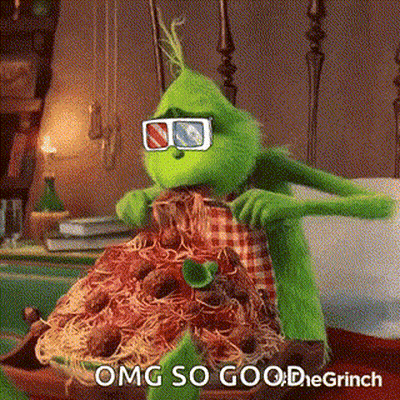 The Grinch Is Sitting On A Bed Eating Spaghetti And Meatballs . GIF