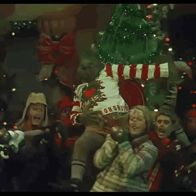 The Grinch Is Wearing A Sweater That Says Ho Ho Ho GIF