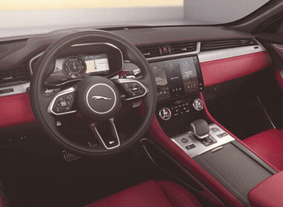 The Interior Of A Jaguar Car Has A Steering Wheel GIF
