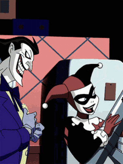 The Joker And Harley Quinn Are Standing Next To Each Other And Smiling GIF