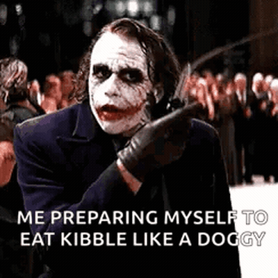 The Joker From The Dark Knight Is Preparing To Eat Kibble Like A Doggy . GIF
