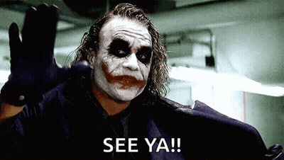 The Joker From The Movie The Dark Knight Is Waving His Hand And Says `` See Ya '' . GIF