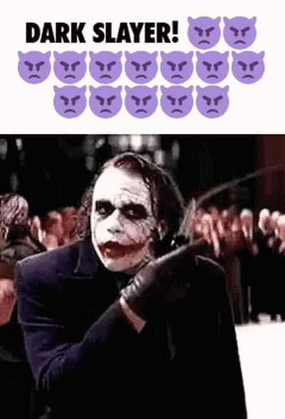 The Joker Is Holding A Knife In Front Of A Crowd And Says Dark Slayer ! GIF