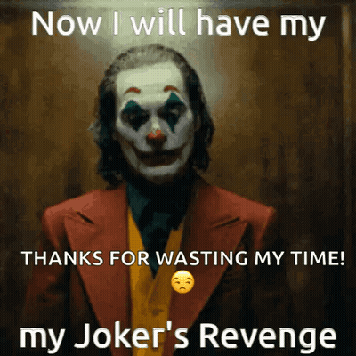 The Joker Is Wearing A Suit And Tie And Has A Sad Face On His Face . GIF