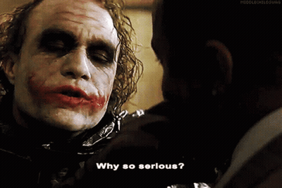 The Joker Says Why So Serious While Looking At Another Man GIF