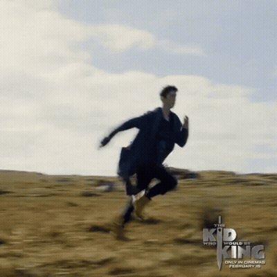The Kid Who Would Be King Poster Man Running In Field GIF