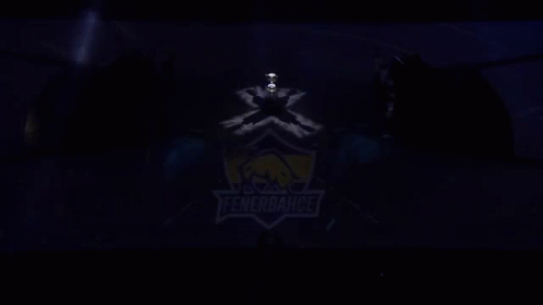 The Logo For Fenerbahce Is Projected Onto A Dark Background GIF
