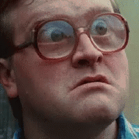 The Man Is Wearing Glasses And Making A Funny Face . GIF