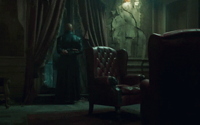 The Matrix Morpheus Turning Around Wicked Smirk GIF