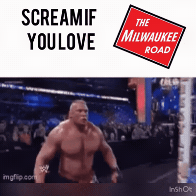 The Milwaukee Road Sign Next To Man GIF