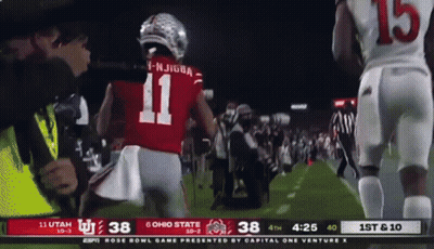 The Number 11 Is On The Back Of A Football Player 'S Jersey GIF