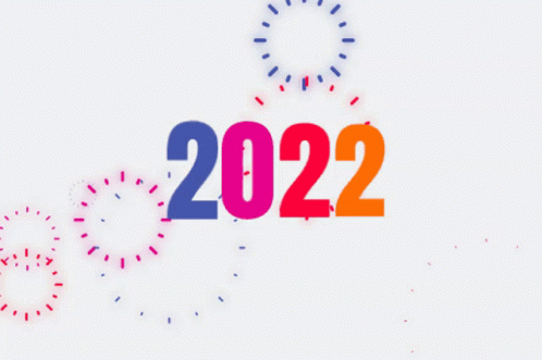 The Number 2022 Is Surrounded By Fireworks And Sprinkles GIF